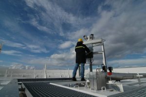 man repairing ac